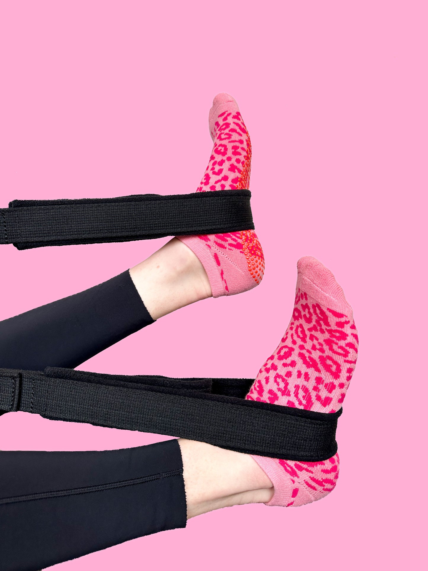 Pink cheetah Flow Peppy, made in New Zealand pilates and yoga ankle grip socks.