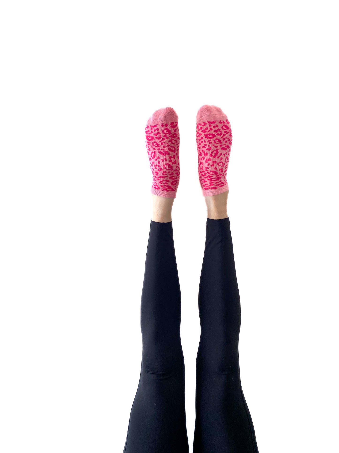 Pink cheetah Flow Peppy, made in New Zealand pilates and yoga ankle grip socks.