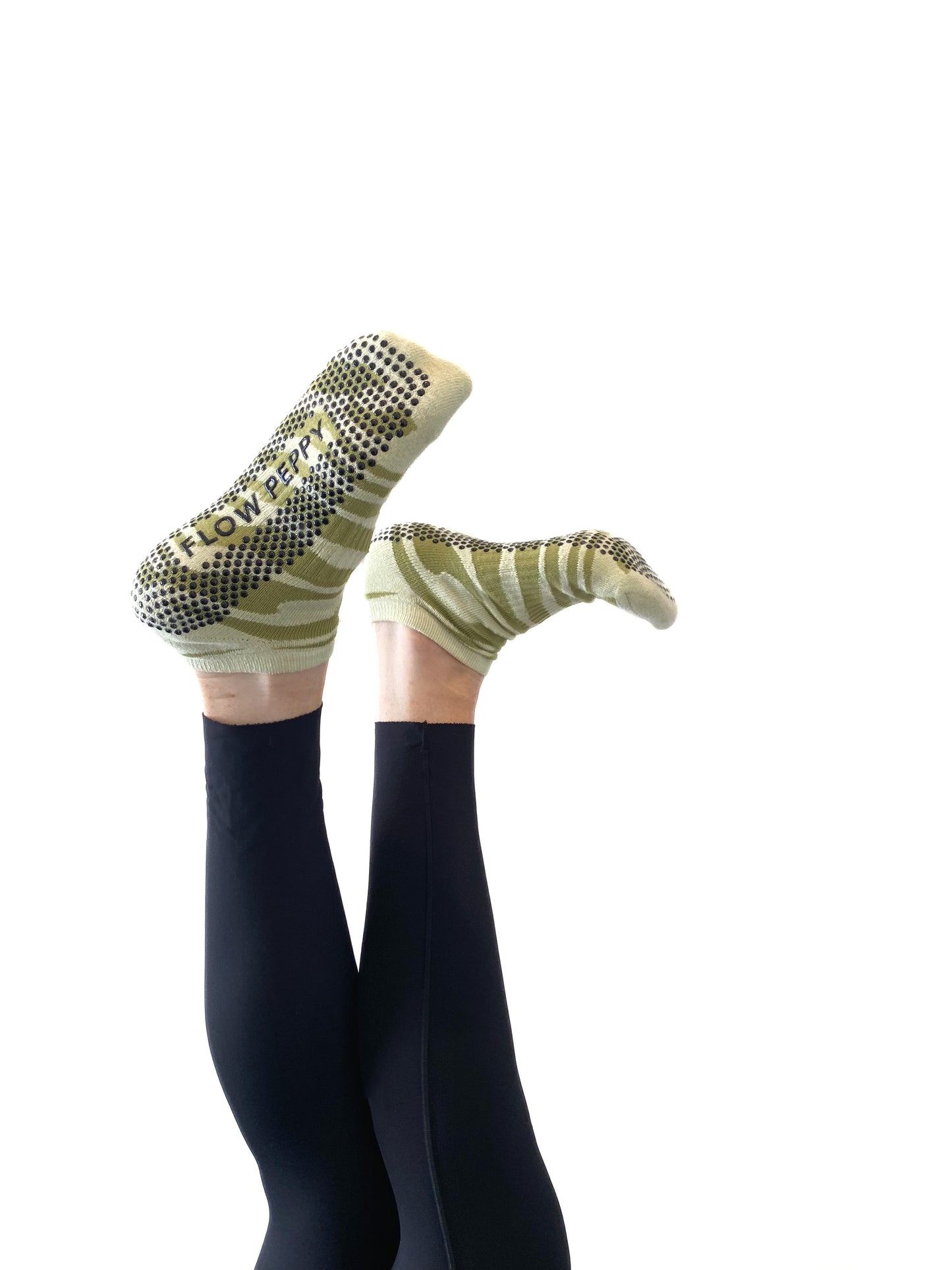 Green patterned Flow Peppy, New Zealand made pilates and yoga ankle grip socks. 